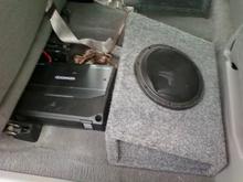 Along with the 8" subs, it came with a 1000W amp.  Pretty sweet combination, ;).
