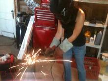My boyfriend fixed my muffler and wanted me to pose for a picture. SORRY! I actually don't know how to weld lol