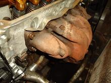 INSTALLED EXHAUST MANIFOLD GASKET