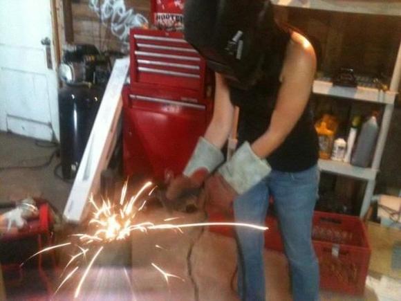 My boyfriend fixed my muffler and wanted me to pose for a picture. SORRY! I actually don't know how to weld lol