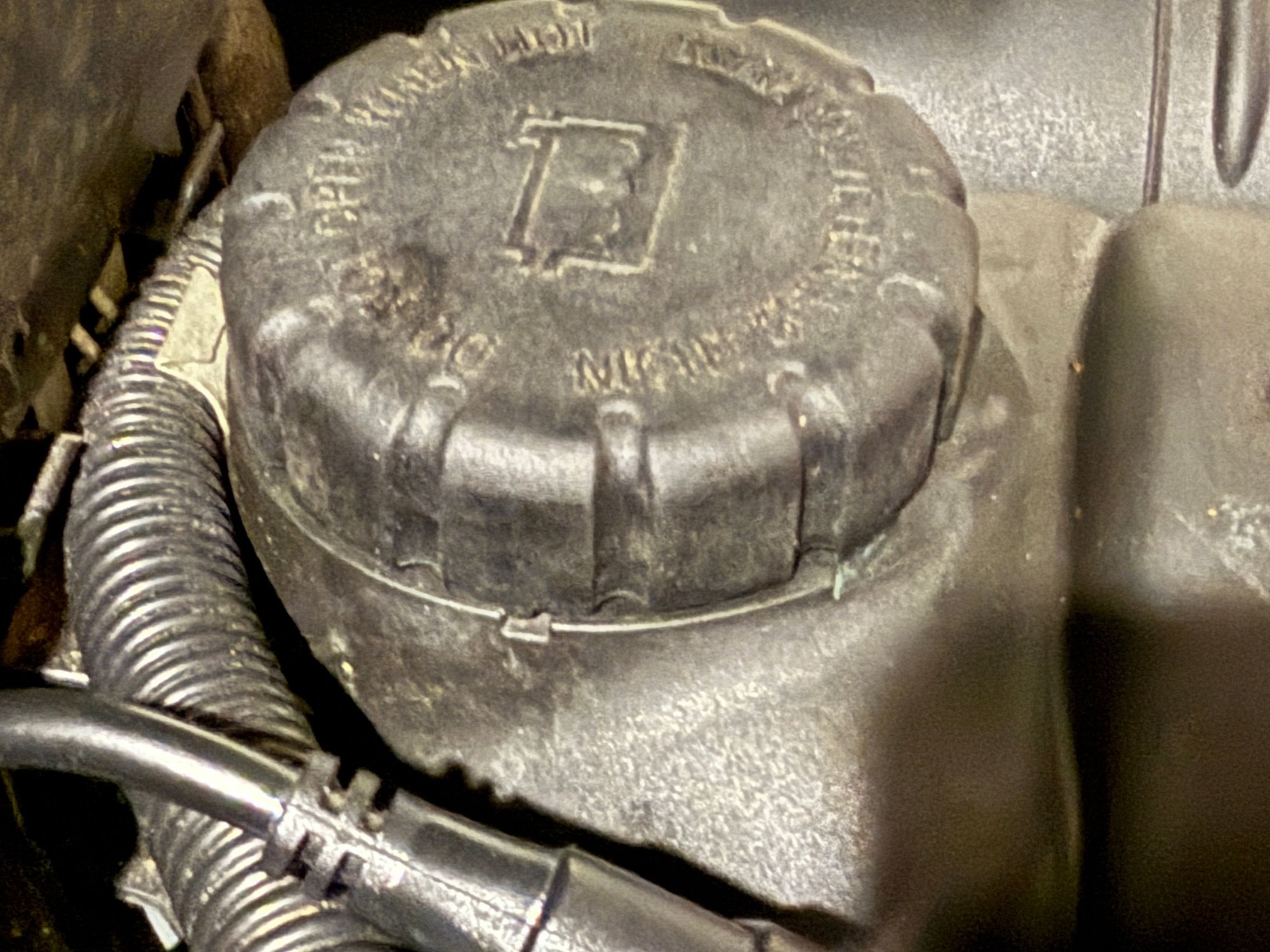 2012 GLK350 coolant Cap - note the small indention at the 6 o�clock position - DO NOT OVERTIGHTEN past this point or you might break the coolant cap sealing mechanism. 