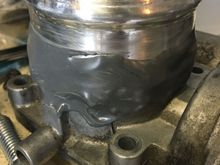 I had a friend weld about 7 or 8 small spots (called tack welds) around the throttle body to connect a bit of aluminum intake pipe with a lip. A lot of heat can get transferred from the welding process into the throttle body and damage it, so I wanted to avoid anything more than a few quick spot welds 

Afterwards I sealed up the new throttle body modification with a healthy layer of jb weld 