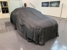 My car was ready to be unveiled when I arrived. All four cars that were being delivered were covered and then later unveiled to the customers. 