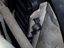 Upper radiator to A/C mounting tabs