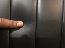 When I push my finger down on the rear seats or the back supports of the front seats it doesn’t show those cracked patterns like the bottom does/cushion area (where your Burt sits). So, the down the road the leather is going to start cracking worse 