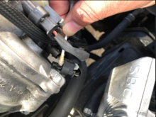 Oil in this connection, closest to the lower Camshaft Position Sensor & Adjuster Magnet on the passenger side