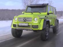 This large beast known as the Mercedes-Benz G500 AMG 4x4² in action on the snowy roads of Russia.