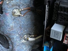 Ground/negative chassis connection. After removing cable, add negative wire from amp and tighten nut
