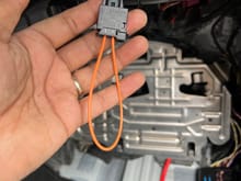 This loop completes the fiber ring once the media interface is removed behind the glove box.  