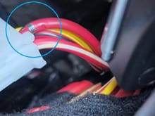 The wire in question was loose and coming out of the connector.
