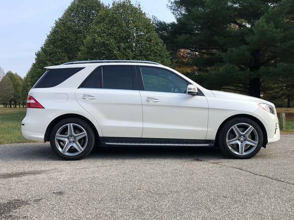 Small curb mark on front passenger side wheel.