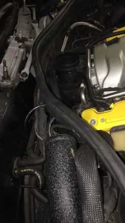 With the wipers removed and some of the charge pipe installed through from the bottom of the car, here’s an example of the route of the intake piping from the rear/underside of the car, into the throttle body 