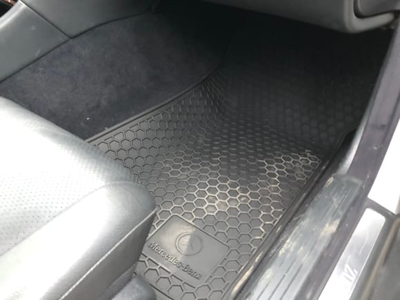 Mb oem rubber floor mat for w203 non-4matic.  Fits fine in my c240 4matic with the transfer case bump 