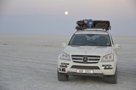 The moon coming up early evening in Lekhubu Island Salt Pan Botswana