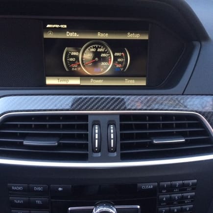 CF interior trim and AMG Media Temp screen showing