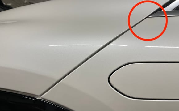 Hood could not be fully aligned due to low clearance in circled area.