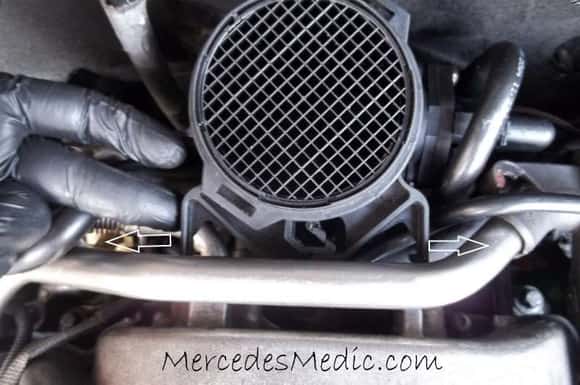The Mass Airflow Sensor will be in the back of the engine. You can't miss it. Do NOT remove it .