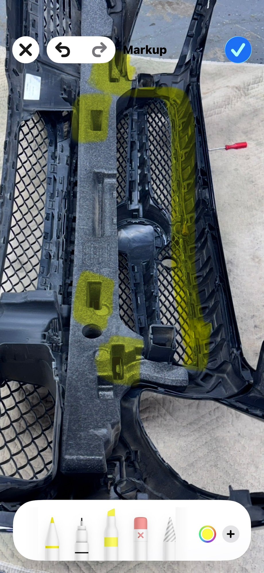 On top is to the right, 4 at bottom from crash bumper support. Clips along top, sides and bottom to push inward