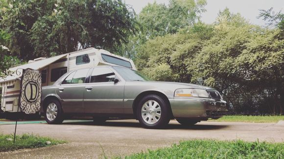 My 2003 Mercury Grand Marquis GS. Spruce Green Metallic with 76,000 miles.