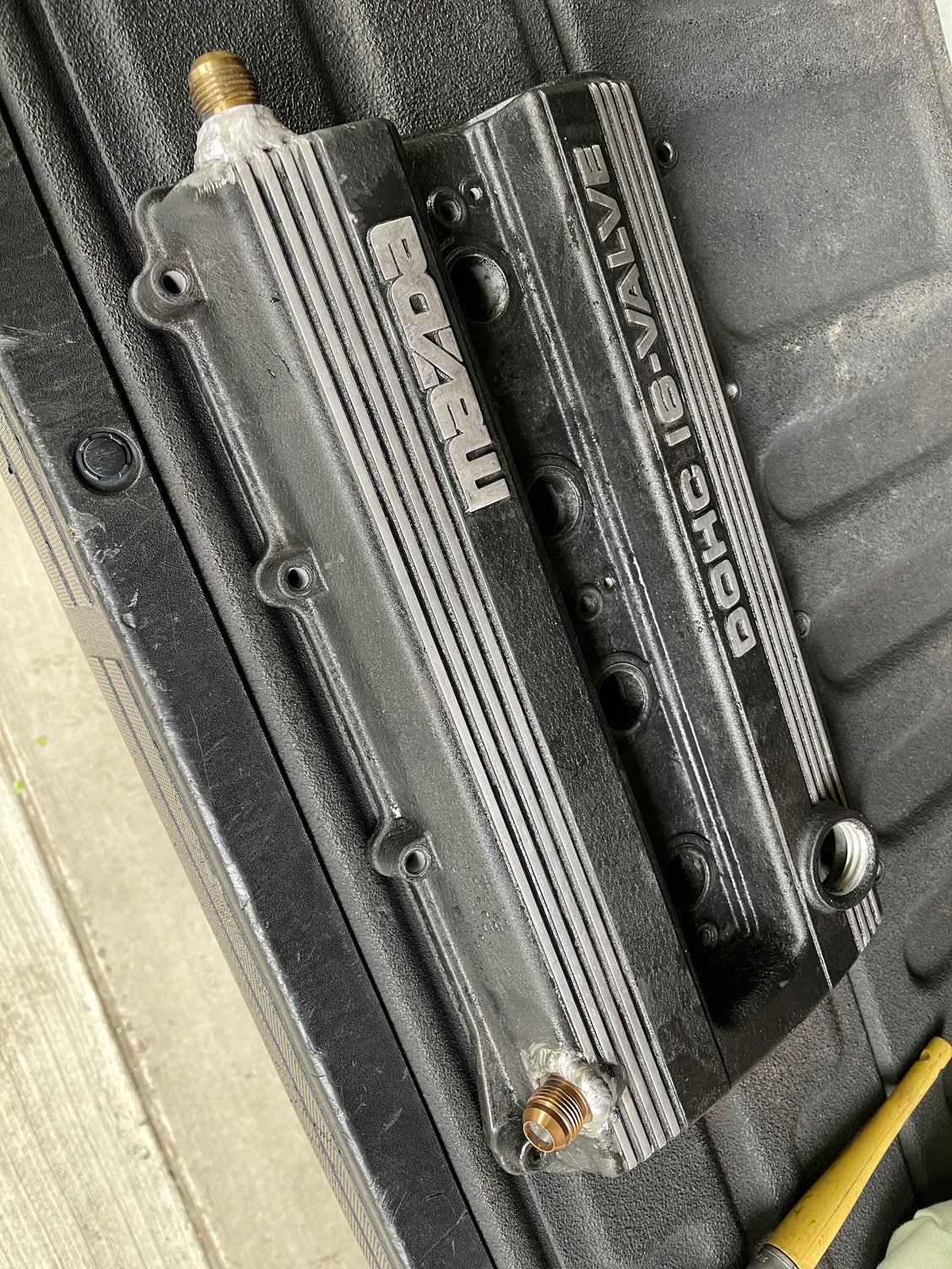 Enlarged the holes in the baffles and had two -10 bungs welded on. 