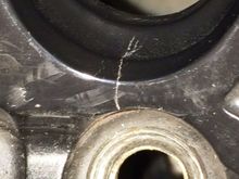 First cracks will show in a hollow between spokes adjacent to a lug hole.