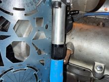 Current oil drain flange, ~5” to a barb AN10 fitting