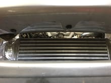 A little air can pass under the IC but there is a good opening above that covers about half of the top of the radiator.