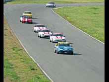 Jeff Lyon, Kevin Wirth and Bob Lyon exiting T1 at Thunderhill in a NASA event in 2010