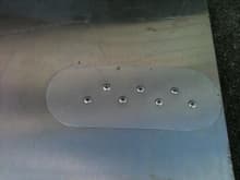Splitter bottom, close-up of rear hook backing plate