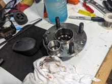 These are the stock hubs.  Repacked with grease but I was able to pull the race out by hand.  Maybe being a worry wart but wasn't a fan. Plastic bearing retainer showed some brittleness and one part was broken.