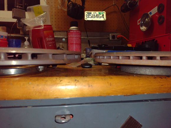 Speaking of weight reduction, I was surprised to do a side by side comparison and found the 11.75x0.81" to feel significantly lighter. Not only is the rotor overall thinner, it also has larger vents, so there's significantly less thermal mass. Looking at it now, it's hard to believe the stock rotor moves much air.