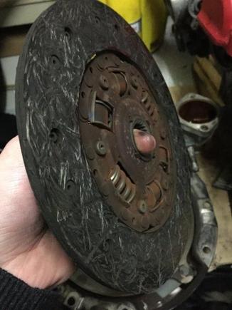 The reason why the clutch slipped on quickly shifting with stock power is quite obvious, this one is toast.