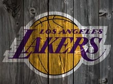 Lakers logo on black and white hardwood