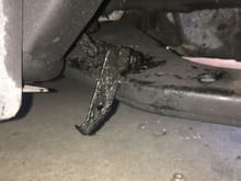 This is sitting on the driver side control arm. I lifted the car up yesterday to see where it goes and could not figure it out. This part seems to not be on the passenger side either. Its attached on the otherside so there are only so many places it could go.

Thanks in advance, I’d like to get my steering back in control. 

PS yes I know there is a lot of oil, I am doing a valve cover replacement this weekend. Might as well do everything at once.