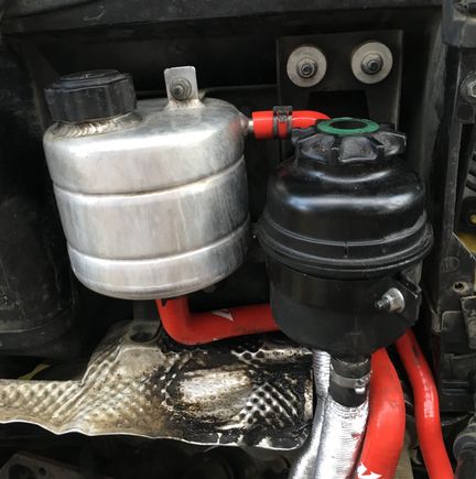New red coolant hoses.