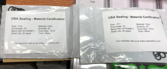 The seals from McMaster-Carr.  2 sizes. These are for the black O-rings.  You'll know which one goes where because... 2 sizes.