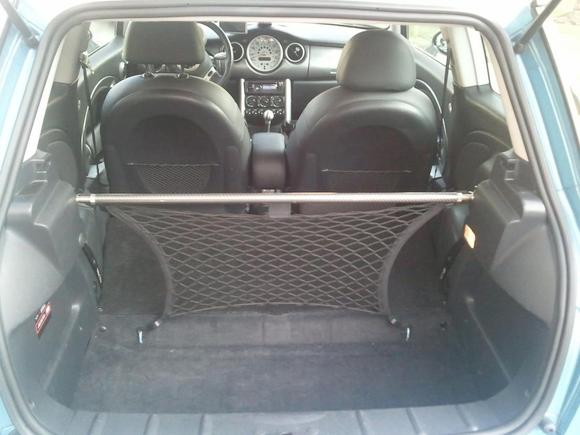 R53 interior, rear seat delete with an interior upper stress bar.