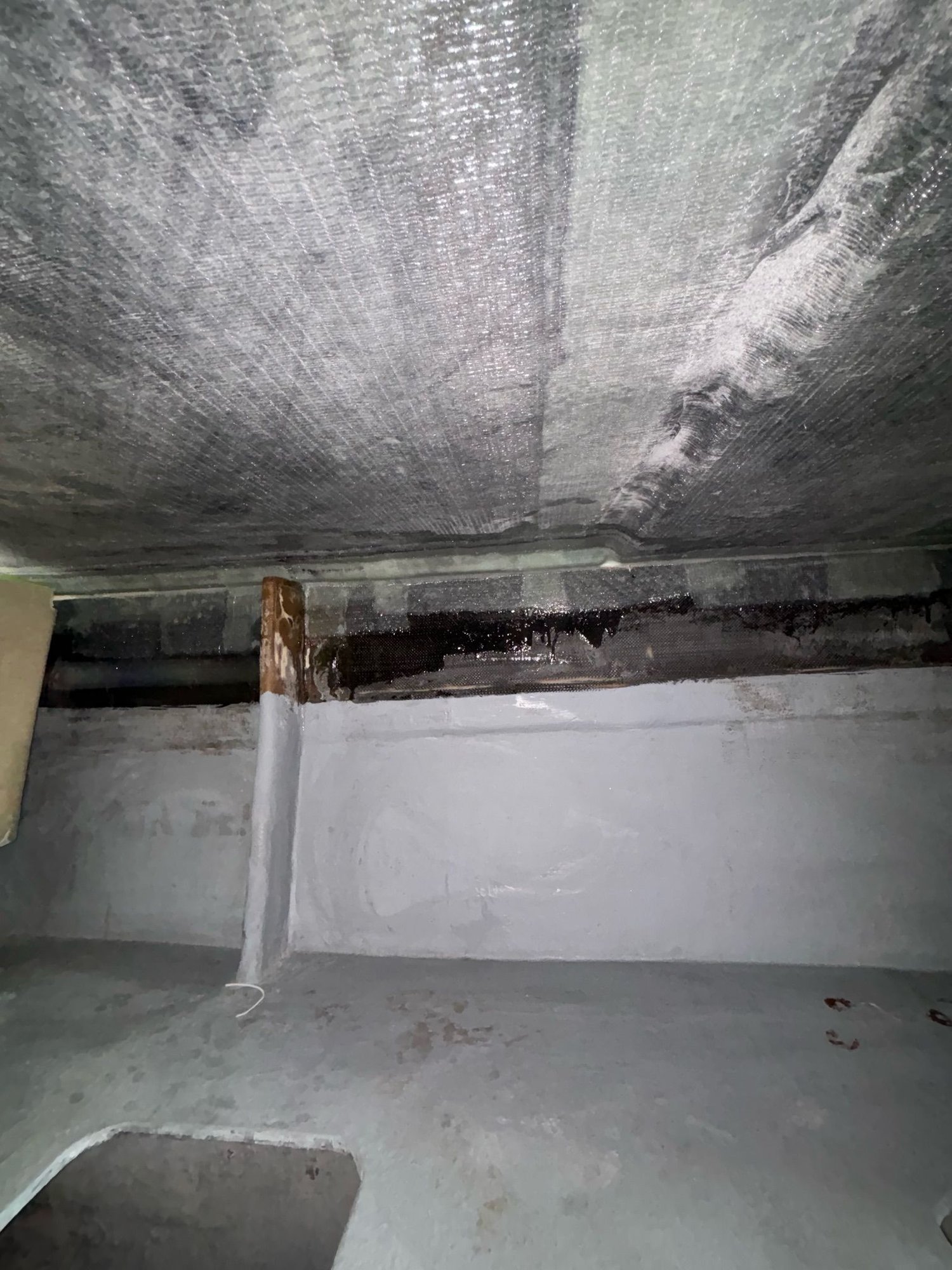 Laminating the hull to the deck with epoxy.