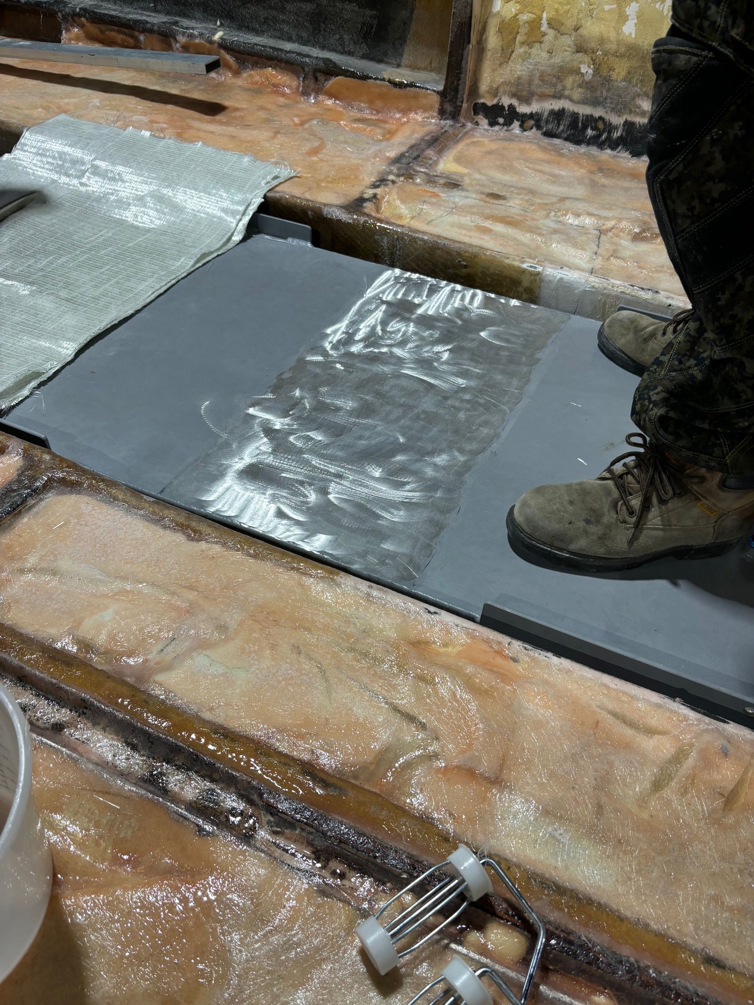 Grinded the top of the fuel tank for where we laminate it in with epoxy.