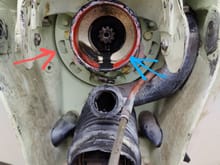 Speedy, red arrow is rear engine mount and theres a big giant o-ring behind it.. on 4 cyl it's the only engine mount blue arrow is end of interm3diate housing 
That's how easy the bellow job is