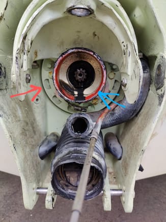 Speedy, red arrow is rear engine mount and theres a big giant o-ring behind it.. on 4 cyl it's the only engine mount blue arrow is end of interm3diate housing 
That's how easy the bellow job is