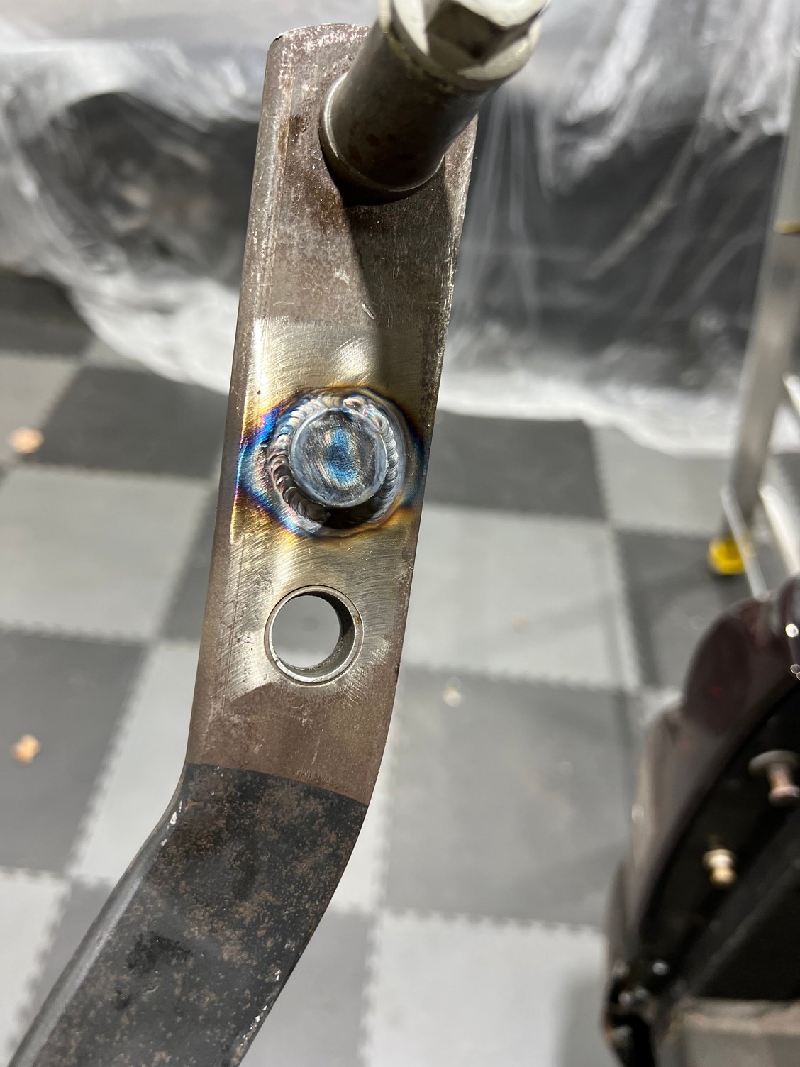 Had my buddy weld it in after drilling a 5/8ths hole and dropping it in. 