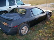 87 fiero Iron Duke 4 cyl auto. was wrecked in front when I got it a lot of work later and all it needed was a paint job. getting old and couldn't fold my big but up well enough to get in and out of it well so we sold them.