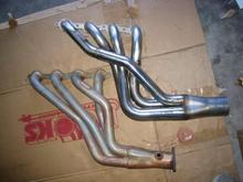 Kooks 1-7/8" to 2" stepped f-body headers vs 6 year old coated Pacesetter truck headers (driver side)