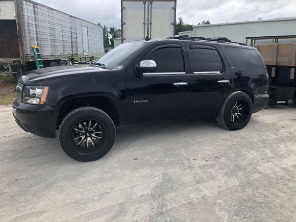 Threw the 20x12 I had laying around on the stock tires for the time being 
12-14,000 lbs of sod in the dump trailer if your wondering…