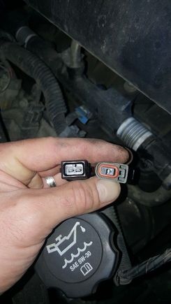 EV1 adapter on left, plug from truck harness on right