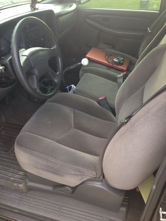 Finished the interior today. Reinstalled my middle seat, transplanted cup holders, installed dynamat across the back and rigged up a shifter boot with an old crown bag.