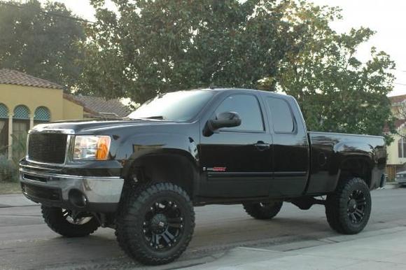 2008 GMC Sierra SLT Vortec Max-6&quot; fabtec lift, 35&quot; toyo mud terrains, 20&quot; Monsters, Smoked Tail lights, tinted windows, hypertec max energy tuner, K&amp;N cold air, Custom Flowmaster Hushpower exhaust