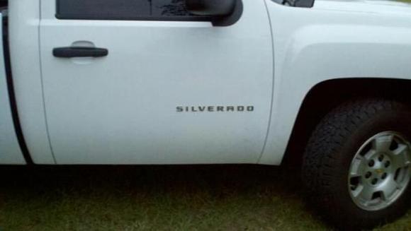 pullin off badges.. deciding if I want to keep the silverado or not?