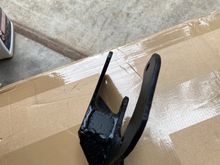 A "strong-back" brace added to prevent flex in the bracket.